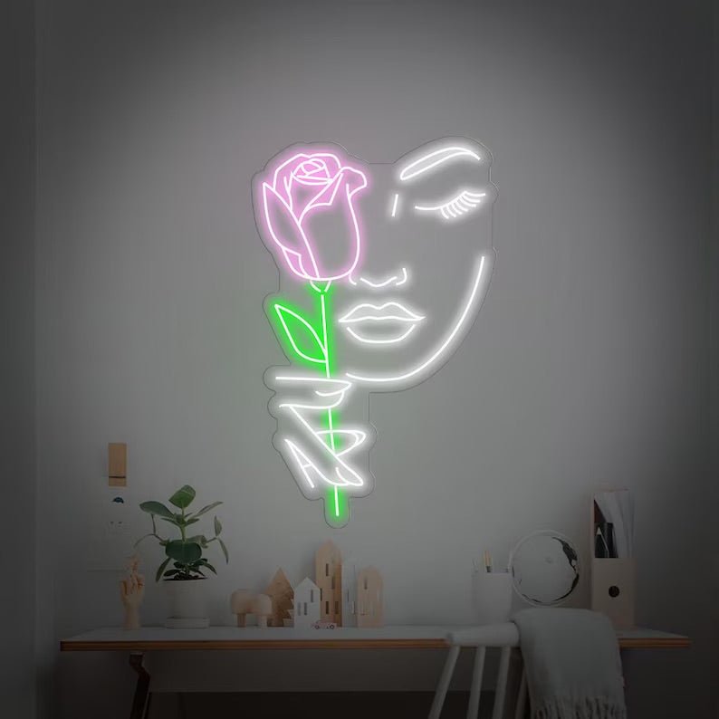 Volto femminile rosa neon - Skizzografico