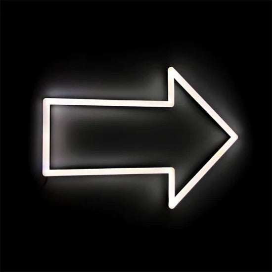 Freccia neon white arrow sign with plexiglass or wall support illuminated on black background